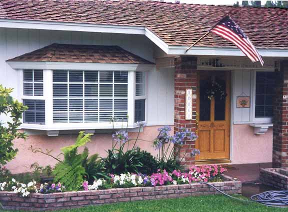 milgard tuscany bay window with roof